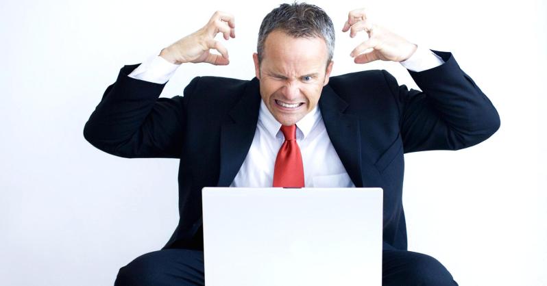 \"100665481-businessman-angry-working-at-laptop-gettyp.1910x1000\"